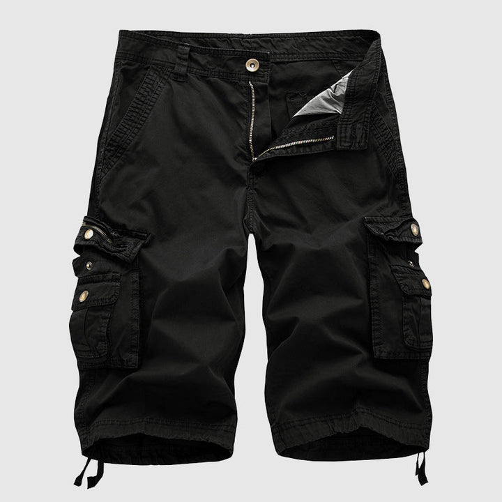 Men's black cargo knee length shorts with utility pockets and zippered detailing