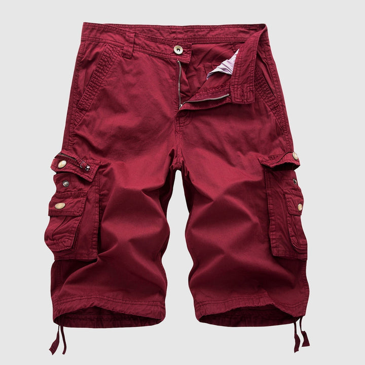 Full length view of men's tactical cargo shorts styled for casual use