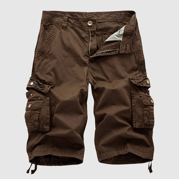 Men's brown cargo knee length shorts featuring classic styling and spacious side storage