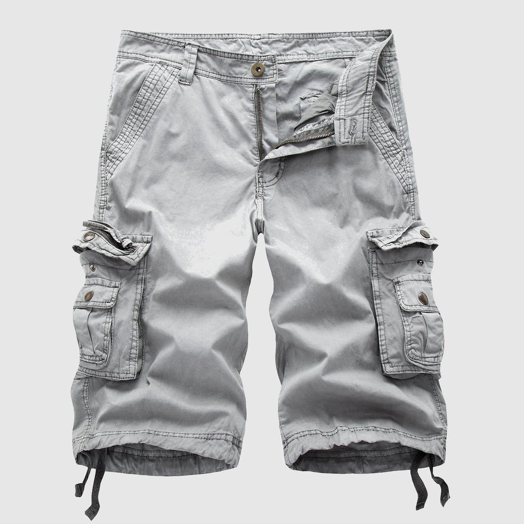 Side view of men's cargo knee length shorts showing utility pockets
