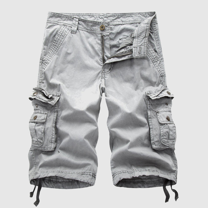 Side view of men's cargo knee length shorts showing utility pockets