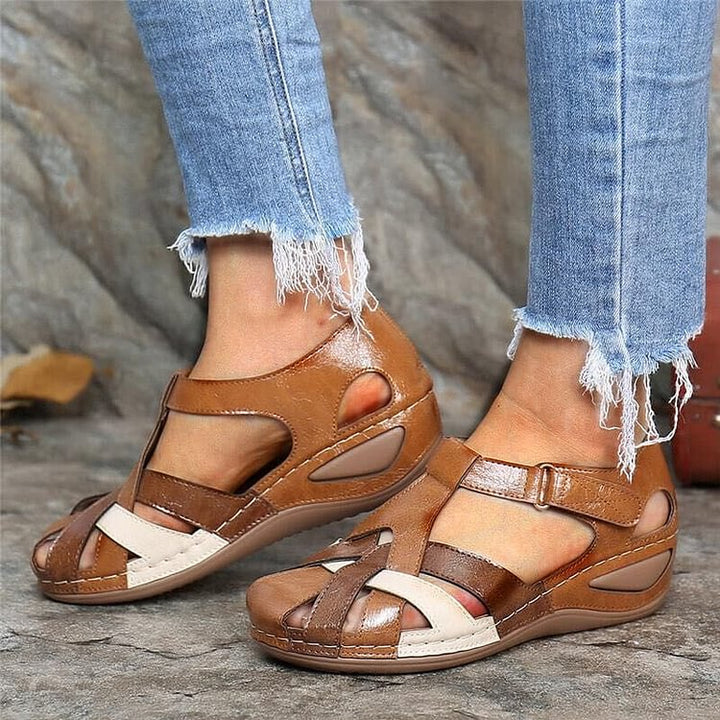 Pair of fashionable women's woven T-strap platform sandals styled for summer