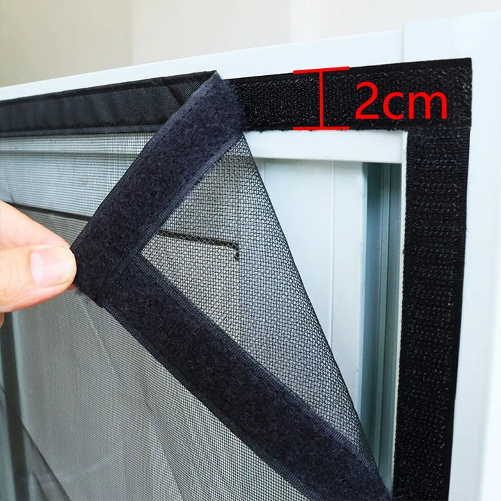 Close-up of adhesive hook-and-loop tape mounting on door frame