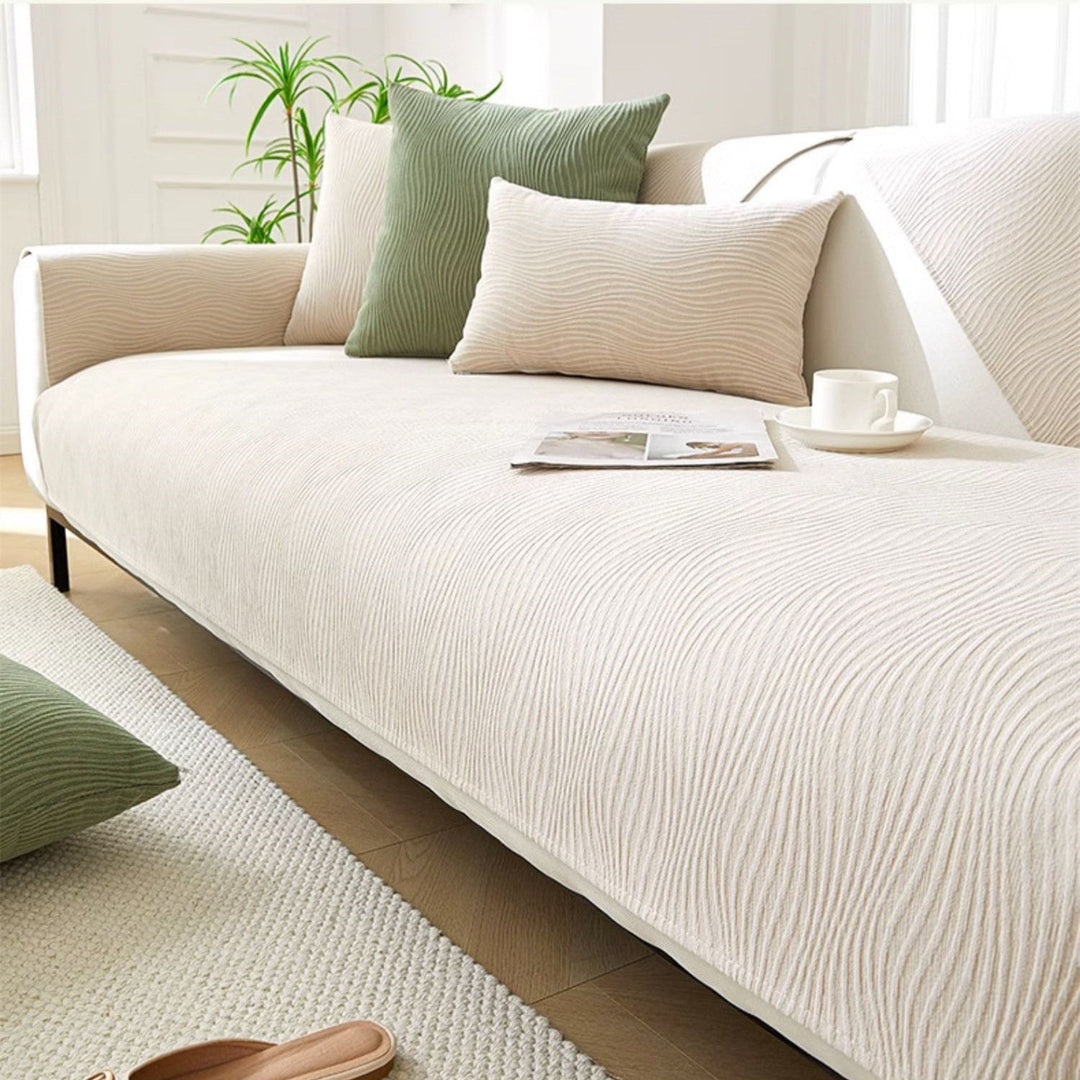 Grey furniture protector sofa cover featuring non-slip grip and minimalist home decor style