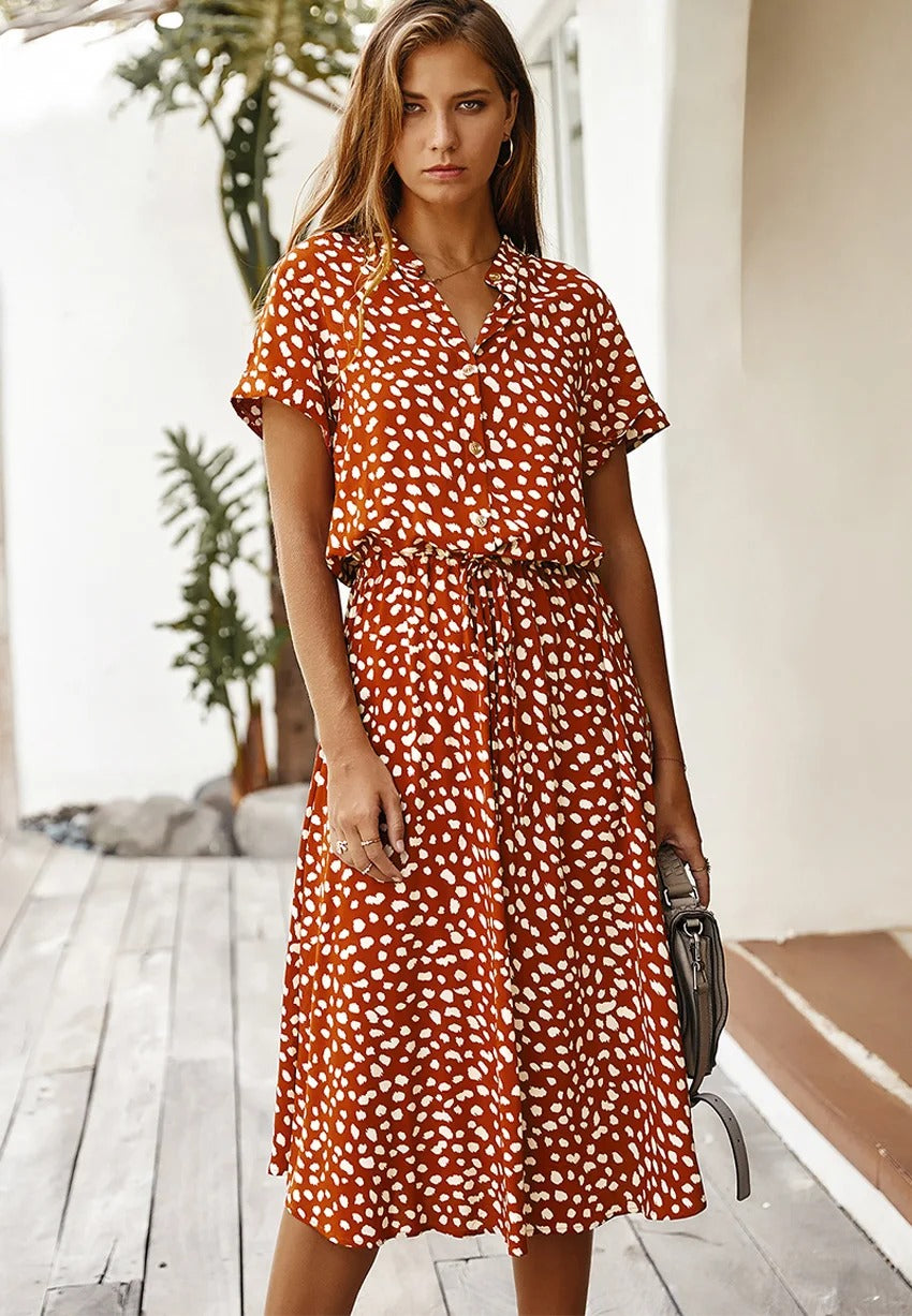 Model wearing comfortable short-sleeve chic summer dress, front view