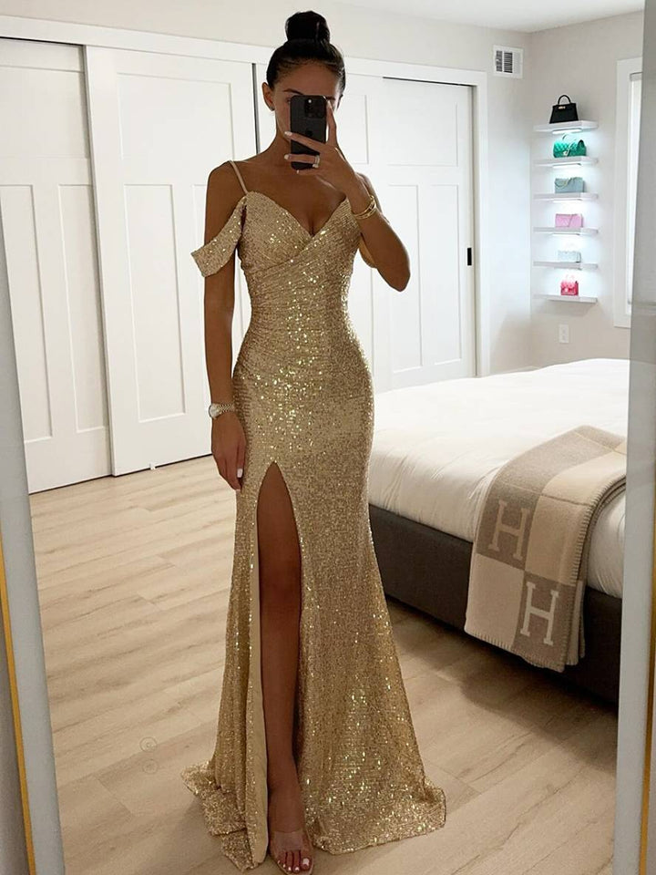 Full-length view of a shimmering champagne evening gown with elegant V-neck and straps