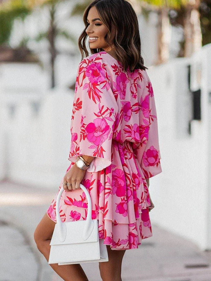 Full length view of the elegant floral party dress styled for evening wear