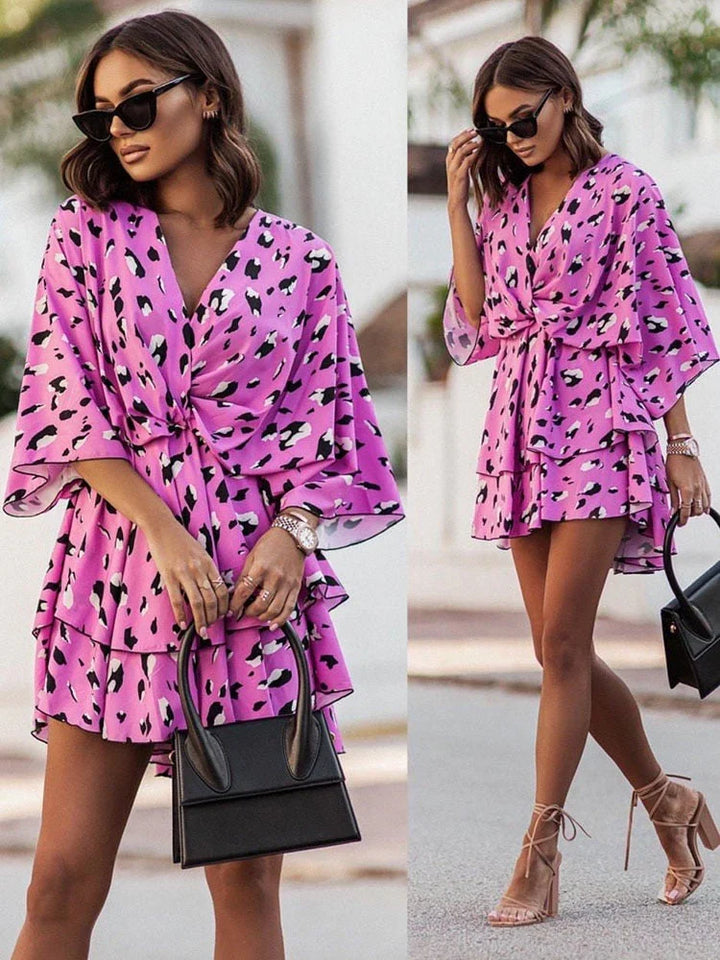 Womens casual wear floral mini dress displayed on a mannequin for fit detail