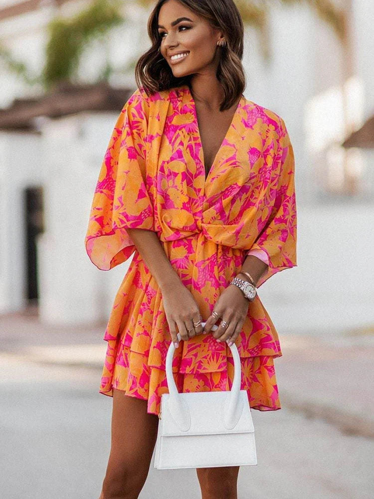 Detailed view of the premium fabric and floral print on the summer mini dress