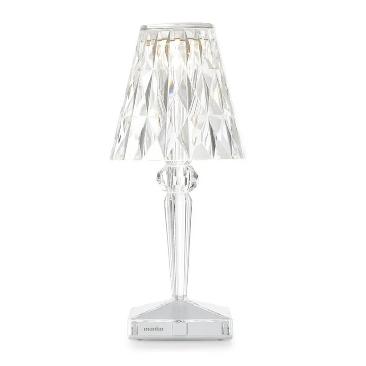 Detailed view of the sparkling crystal shade on a modern lamp base