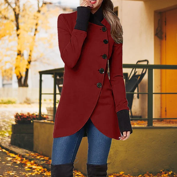 Woman wearing red Sierra windbreaker outdoors in autumn