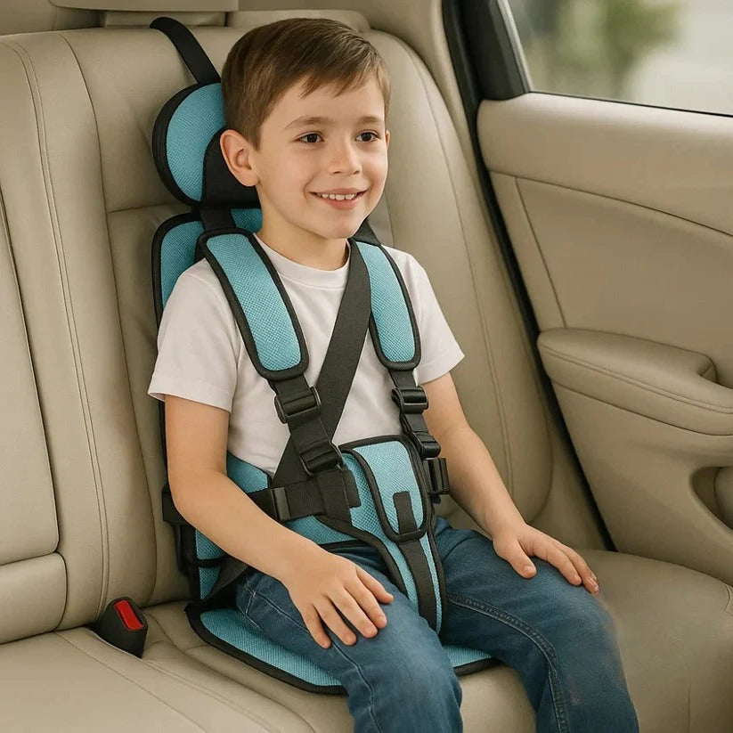 Lifestyle shot of toddler sitting comfortably in the travel safety seat
