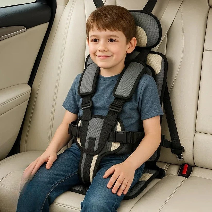 Travel booster seat folded compactly for easy baby travel gear storage