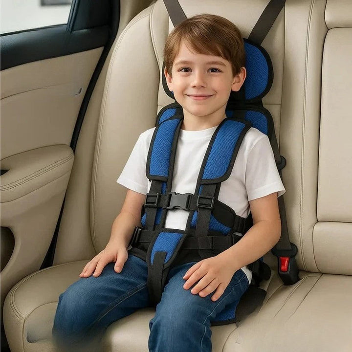 Child car seat back view showing vehicle attachment straps