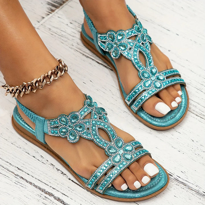 Rhinestone floral flat sandals for women featuring delicate strappy details