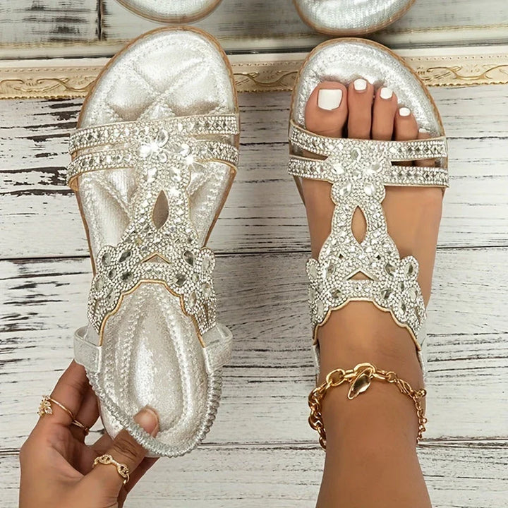 Casual summer shoes with sparkling floral embellishments and flat soles