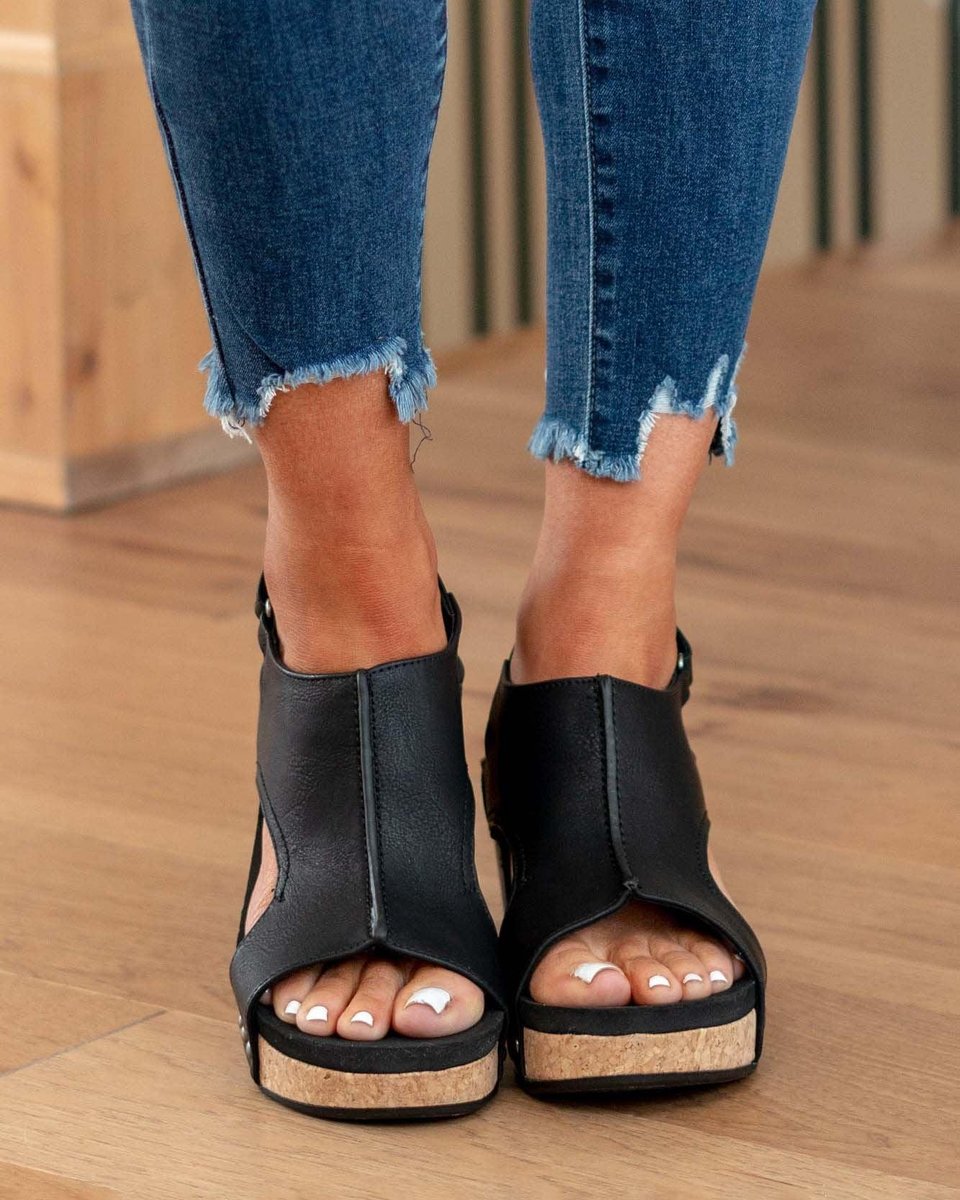 Black stylish wedge sandals with slingback strap and platform