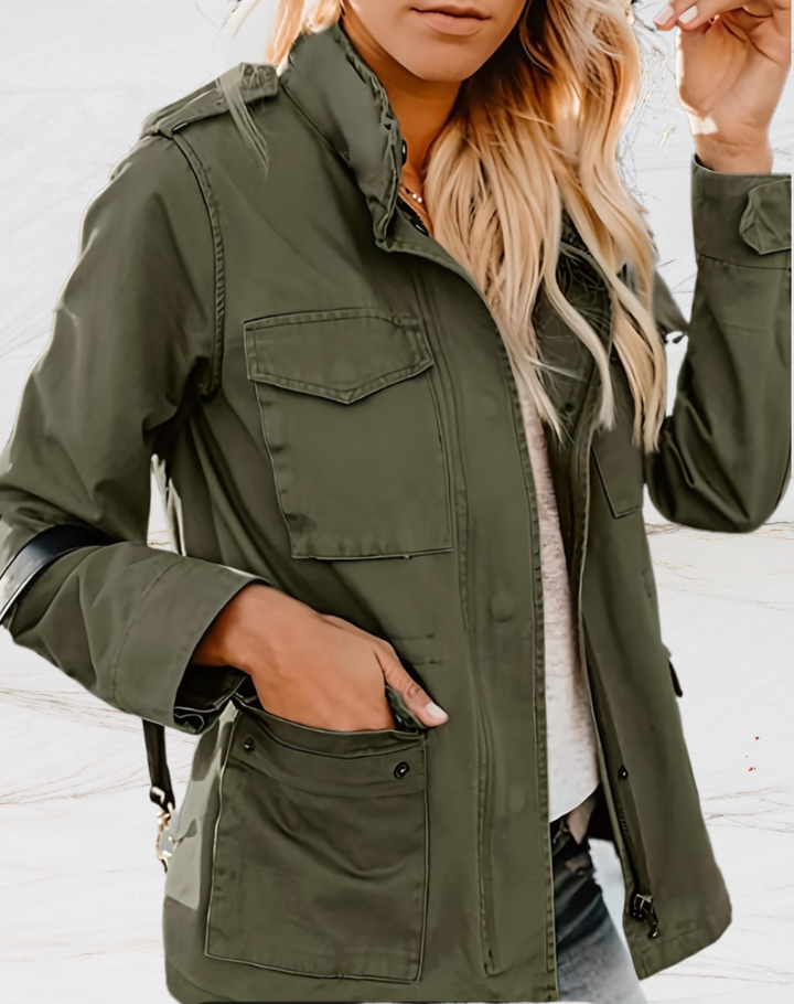 Back view of black women's military utility jacket featuring a drawstring waist and durable casual coat outerwear design.