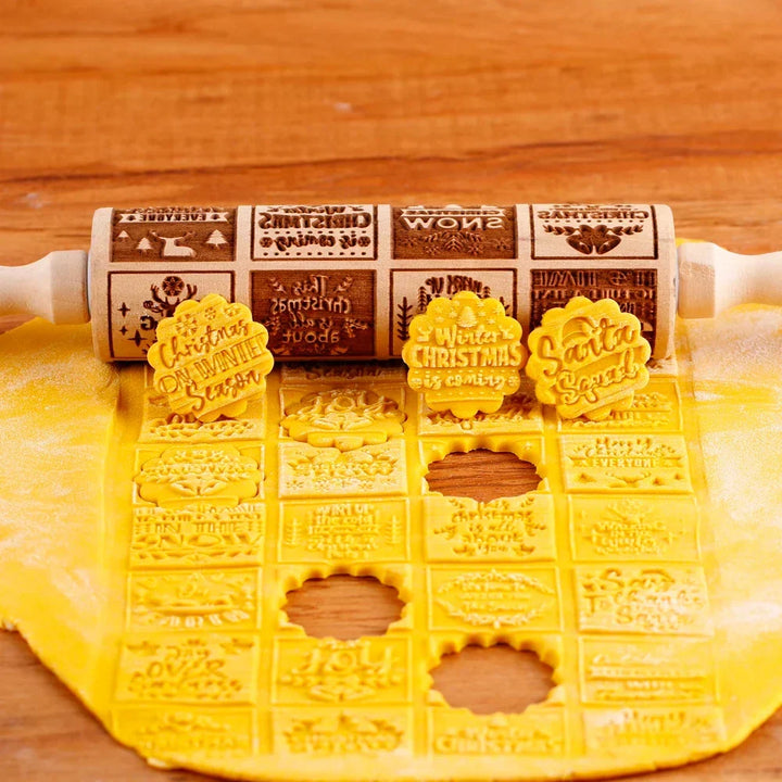 Wooden Christmas embossed rolling pin imprinting patterns on yellow cookie dough