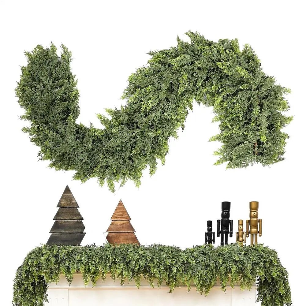 Artificial cypress Christmas garland draped over a fireplace mantel with holiday decorations
