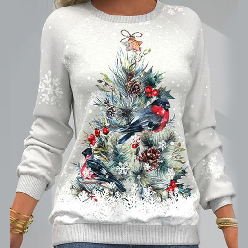 Woman wearing a festive white Christmas tree print sweatshirt with raglan sleeves