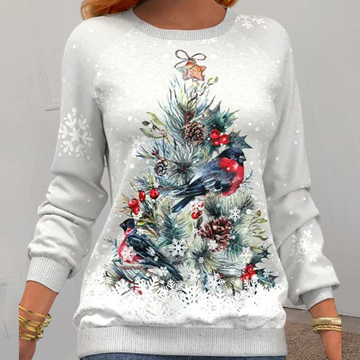 Flat lay of a festive Christmas sweater for women, showcasing seasonal graphic sweatshirt styling