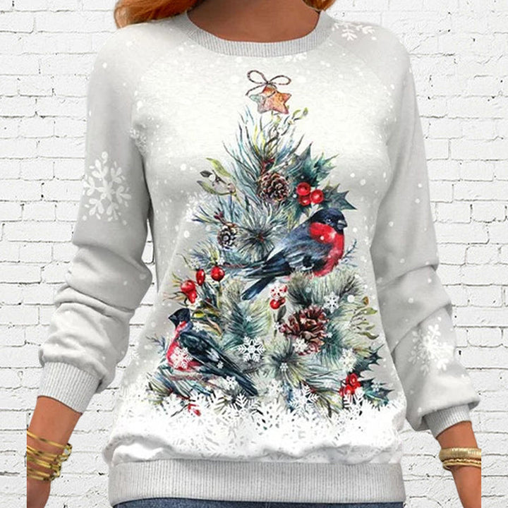 Detailed shot of raglan sleeve on women's holiday pullover winter clothing graphic sweatshirt