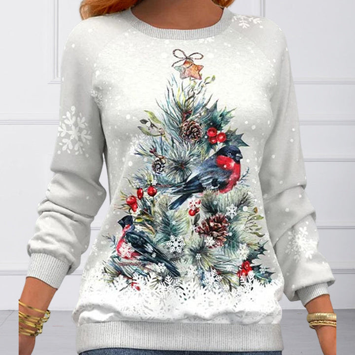 Folded women's festive top and Christmas sweater, highlighting soft holiday graphic sweatshirt material