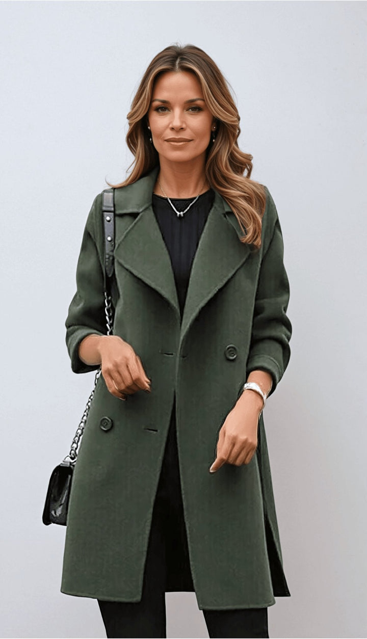 Woman wearing an army green double-breasted mid-length coat with a notched lapel