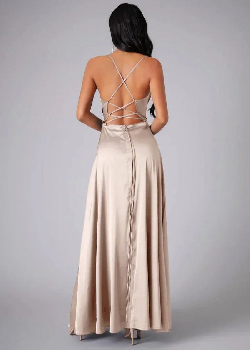 Back view of beige satin maxi gown showing lace-up closure