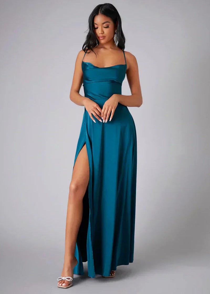Women's satin maxi gown featuring a dramatic high slit for formal evening wear