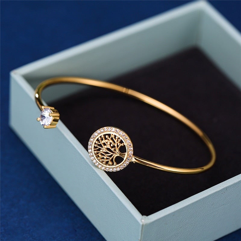 Gold tree of life bangle bracelet with sparkling zirconia in a gift box