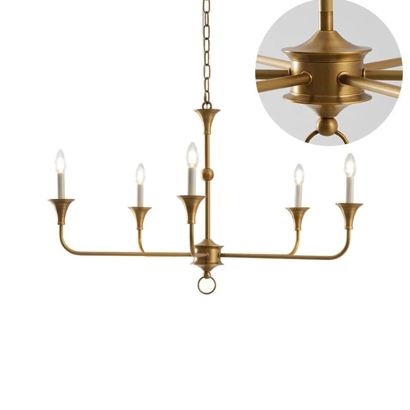Classic brass chandelier ceiling light installed in an elegant dining room