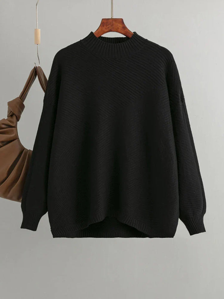 Classic black ribbed knit jumper showcasing its textured pattern