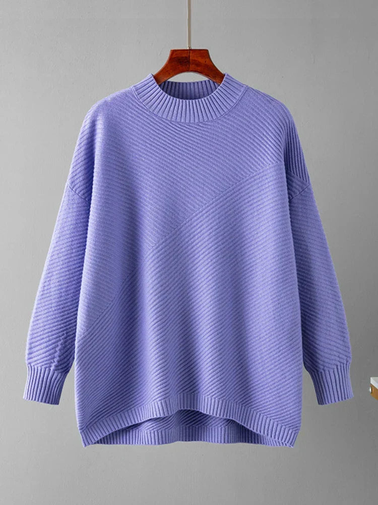 Close-up view of a fall fashion crew neck sweater showcasing soft ribbed knit texture.