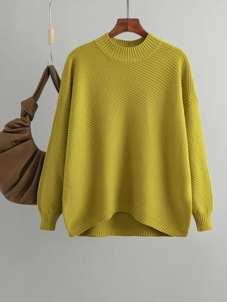 Women's classic ribbed knit jumper featuring an oversized fit and cozy crew neck design.