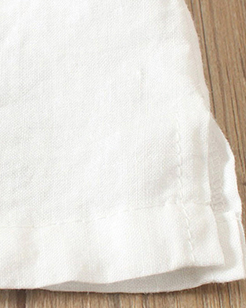 Close-up of button detail on women's casual t-shirt