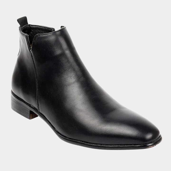 Back view of men's classic ankle boots with sturdy heel for formal wear