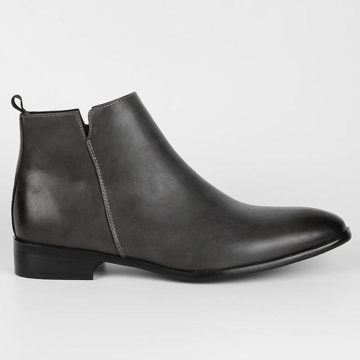 Top down view of men's side zip boots showcasing premium leather interior