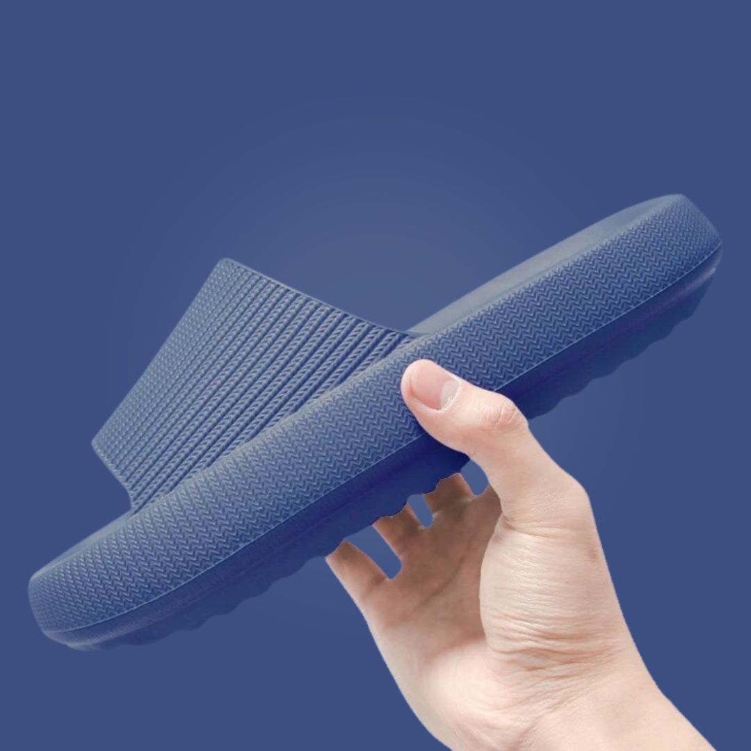 Close up of flexible waterproof material on comfortable unisex house slippers