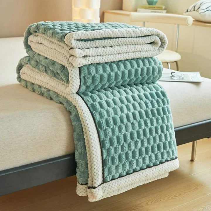 Side angle of the cozy blanket showing elegant drape and soothing weight