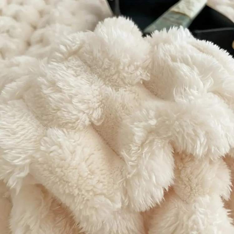 All season blanket laid flat displaying modern neutral tones for home comfort