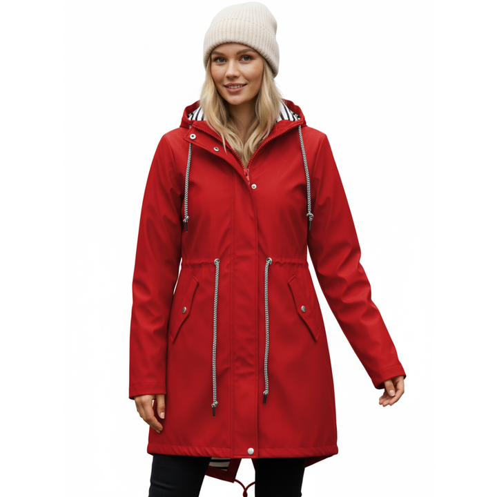 Model wearing a vibrant red waterproof rain jacket with front pockets