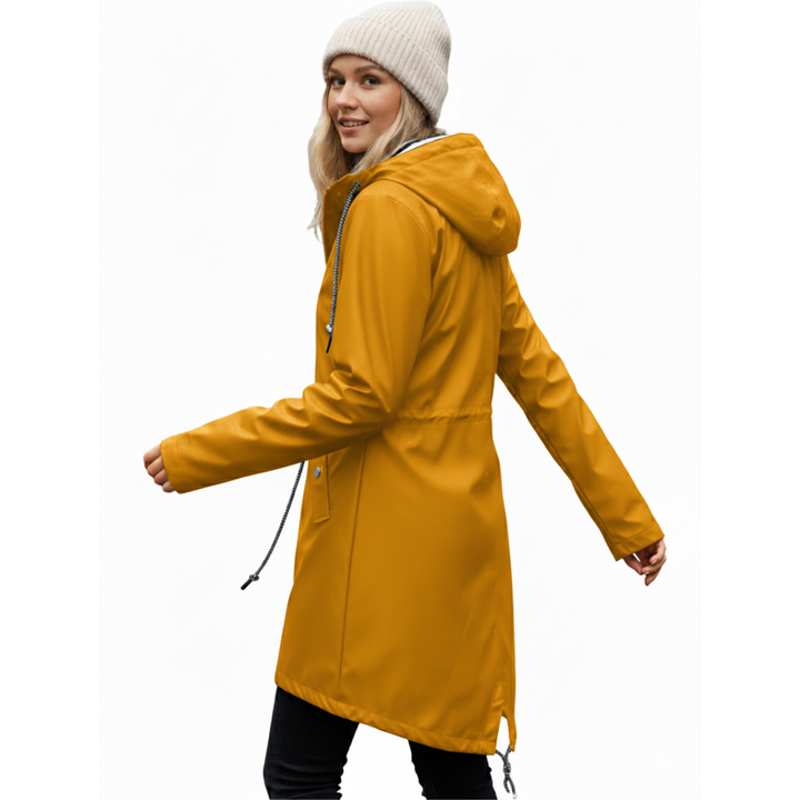 Back view of the lightweight waterproof coat for women, showing a flattering tailored fit.