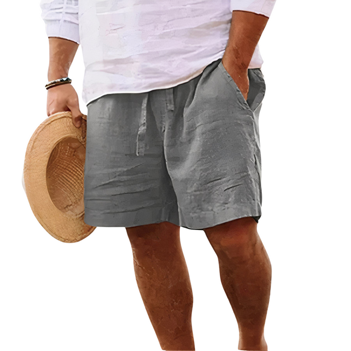 Close-up of adjustable drawstring waistband on men's casual summer shorts
