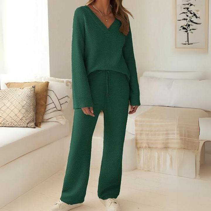 Flat lay of warm women two piece fleece outfit for cold weather