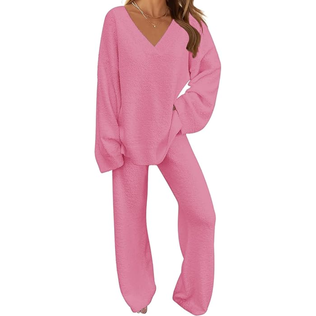 Woman wearing bright pink fleece lounge set
