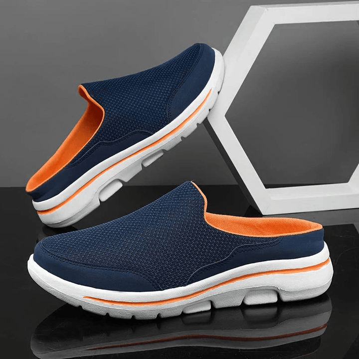 Blue men's comfort slippers with orange inner lining and thick white sole