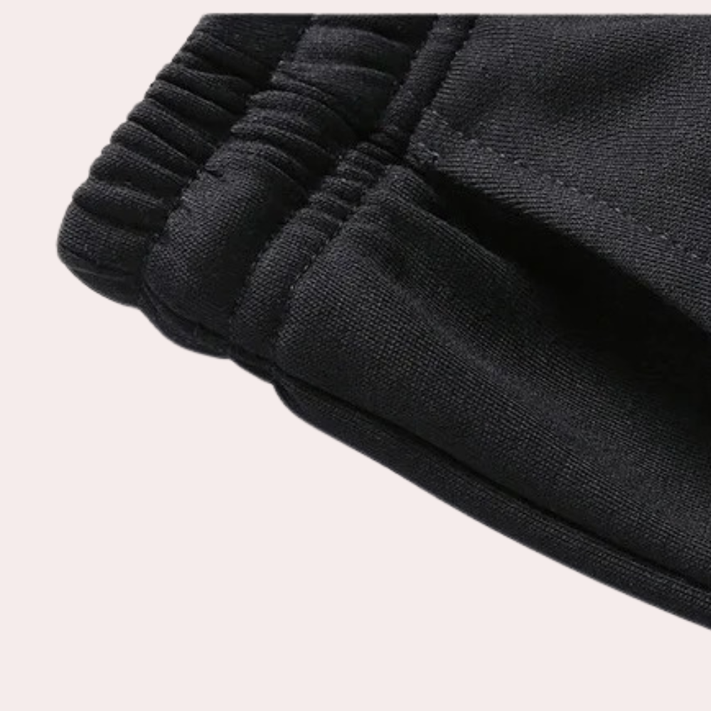 Close up fabric detail of mens casual loungewear matching tracksuit set