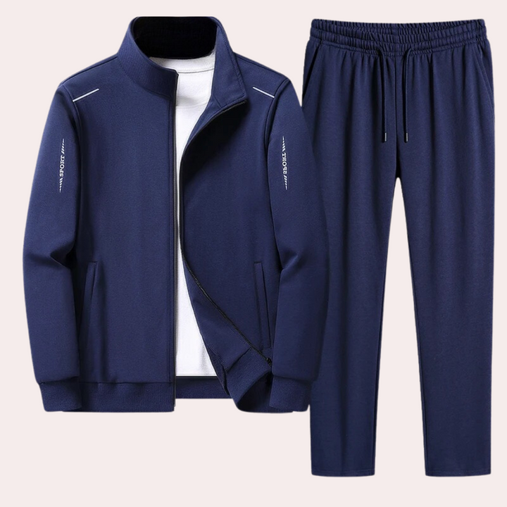 Blue men's athletic tracksuit set featuring full-zip jacket and pants